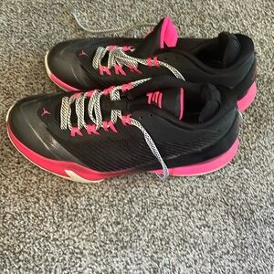 Size 7Y Jordan tennis shoes! These will also fit a women’s size 8/8.5!